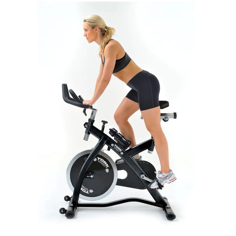 York Barbell Indoor Training Bike CSB32 woman using the bike